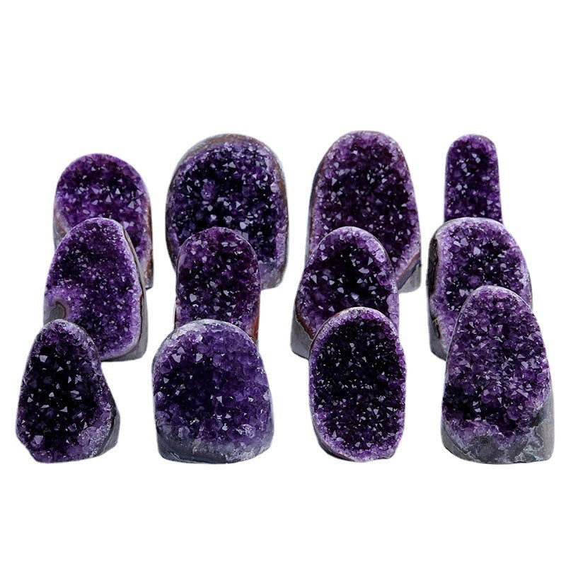 A row of amethyst geodes showing how each specimen's natural shape differs